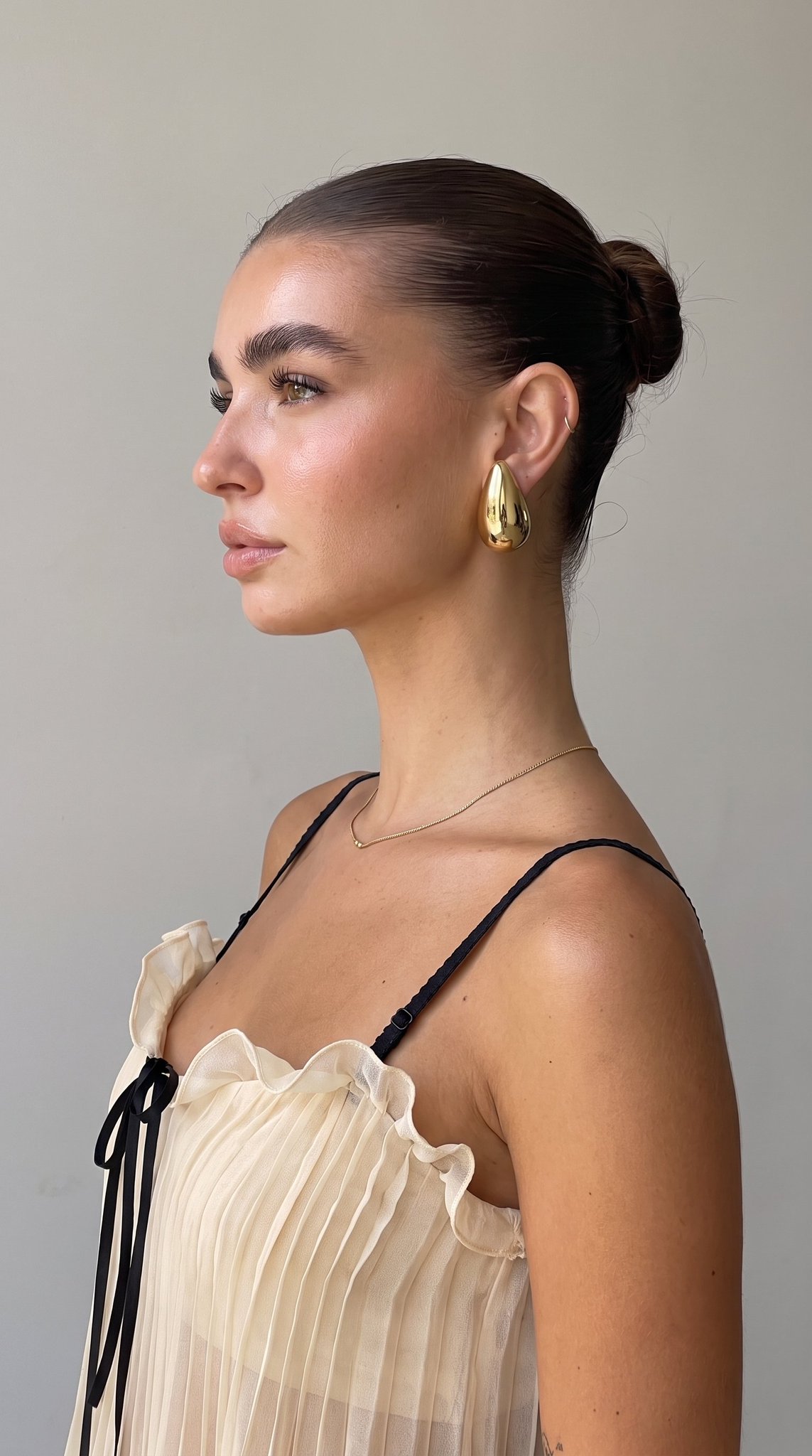 AI avatar reference image, side profile of the same generated woman